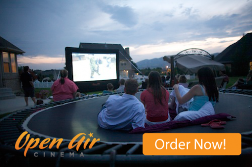 Open Air Cinema Home 12' outdoor movie system in a backyard