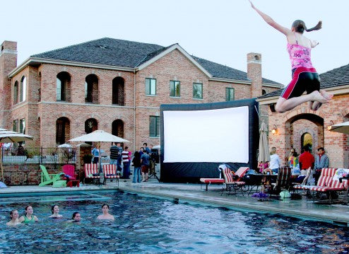 Poolside outdoor movie with the Cinebox Pro 16' screen