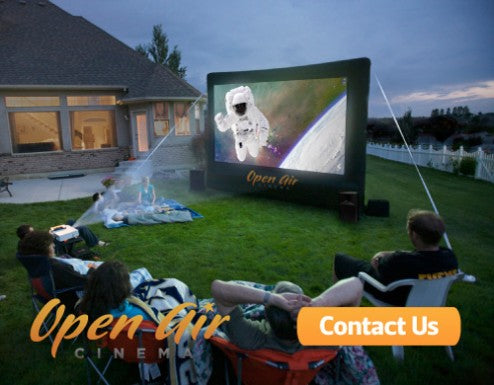 Open Air Cinema Home 12' outdoor movie system set up in a backyard