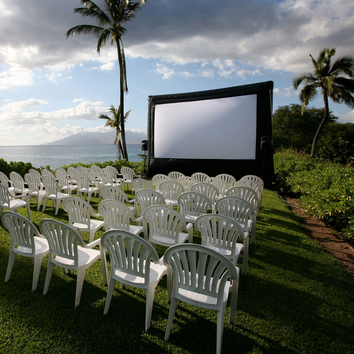 Open Air Cinema Pro outdoor movie screen at a beach event in Hawaii