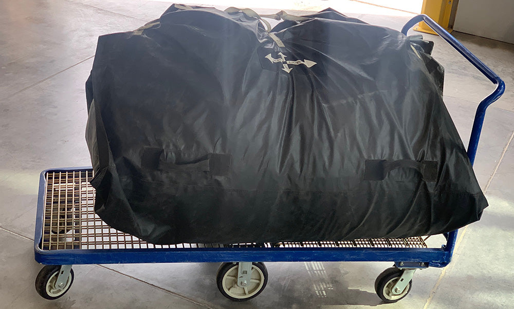 Open Air Cinema Elite 40' screen packed and rolled for transport